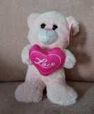 Oso de peluche rosa