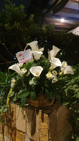 Canasta de pésame con cartuchos