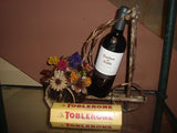 Bicicleta de Madera, Toblerone y Vino Casillero del Diablo