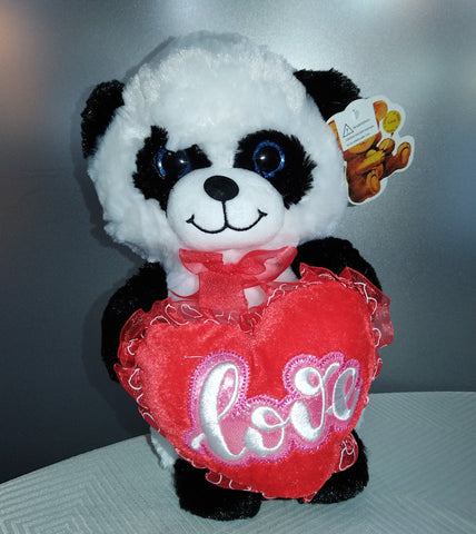 Peluche con corazón musical