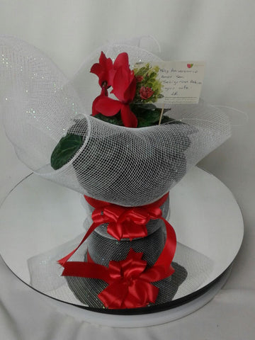 Maceta de Flores Rojas