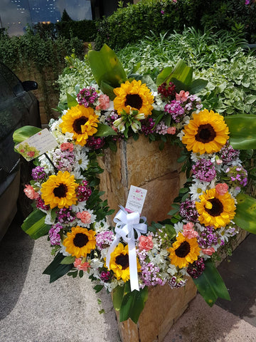 Corona de condolencias con Girasoles